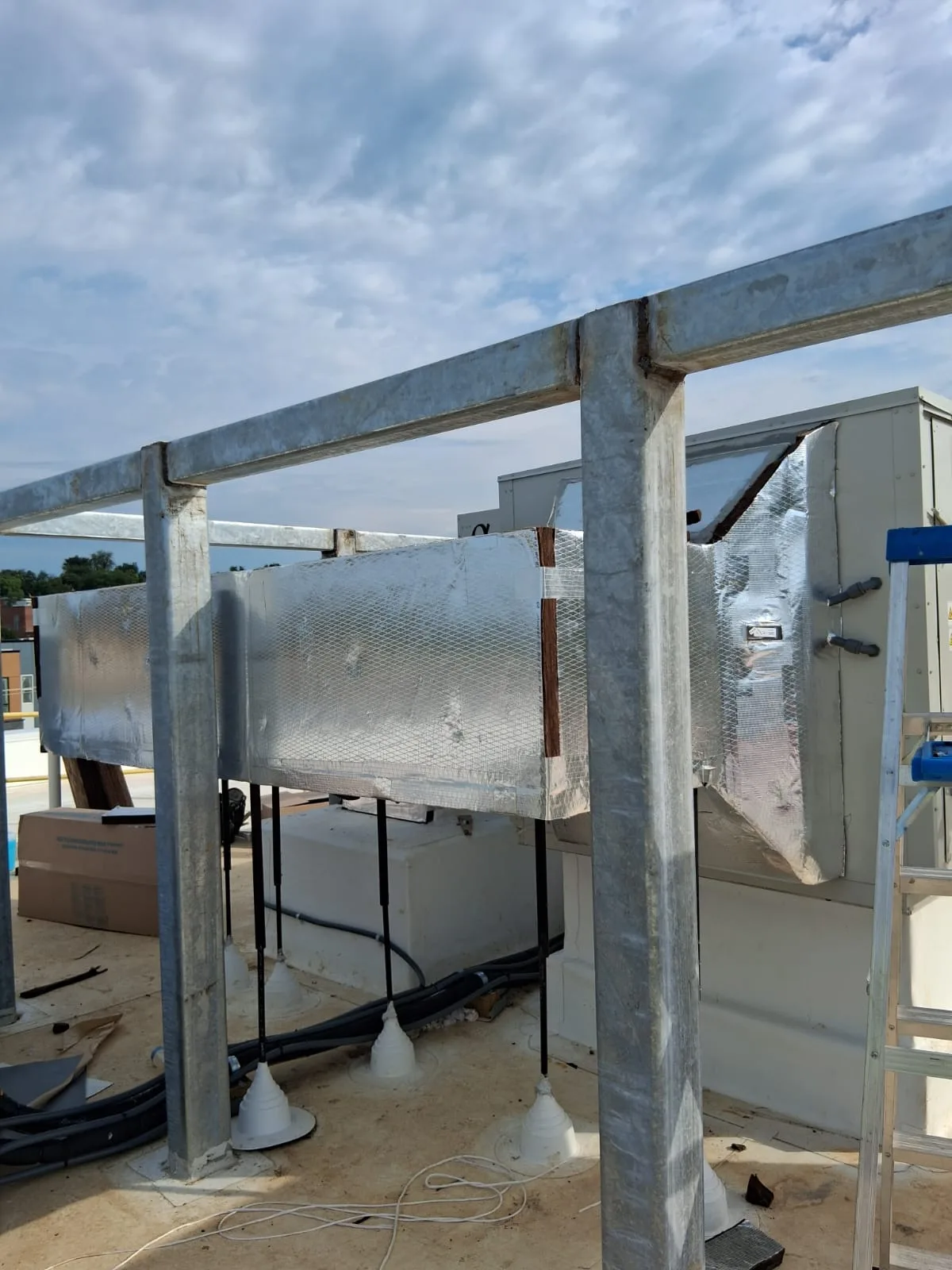 Foil faced pipe insulation before jacketing
