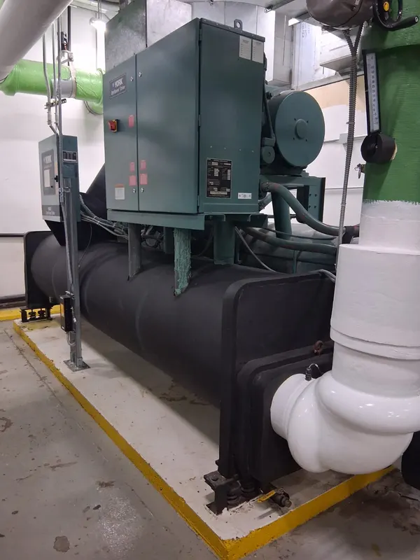 Insulated chilled water piping in a mechanical room