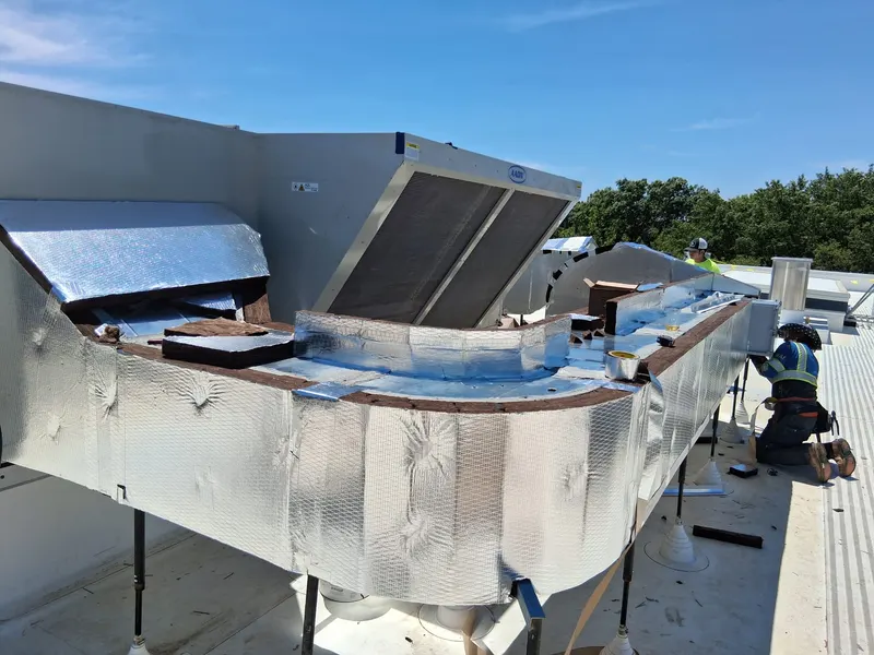 Metal jacketed plenum and ductwork on a commercial roof