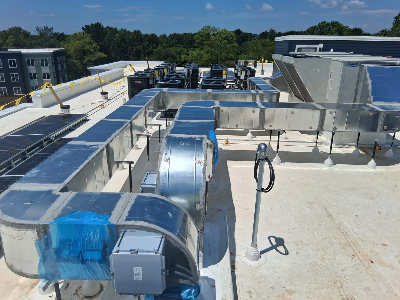 Rooftop metal jacketing run by Sabaoth FQ, real jobsite