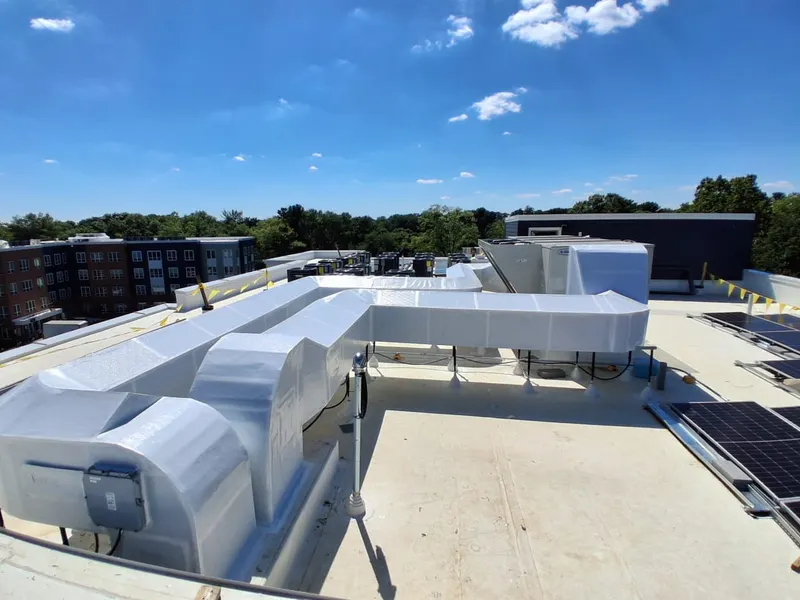 Rooftop panorama of insulated ductwork wrapped by Sabaoth FQ