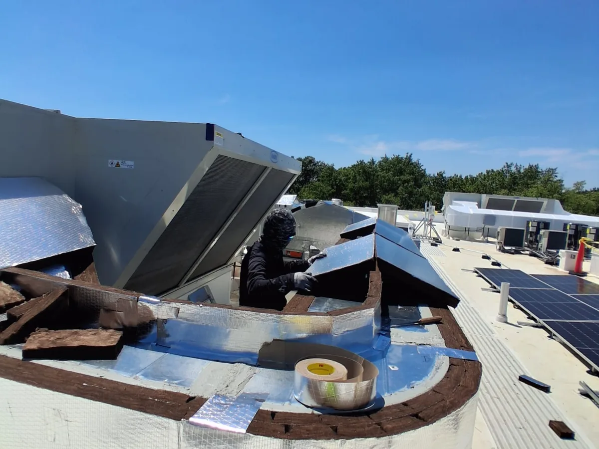 Roof curb opened for insulation demolition and replacement